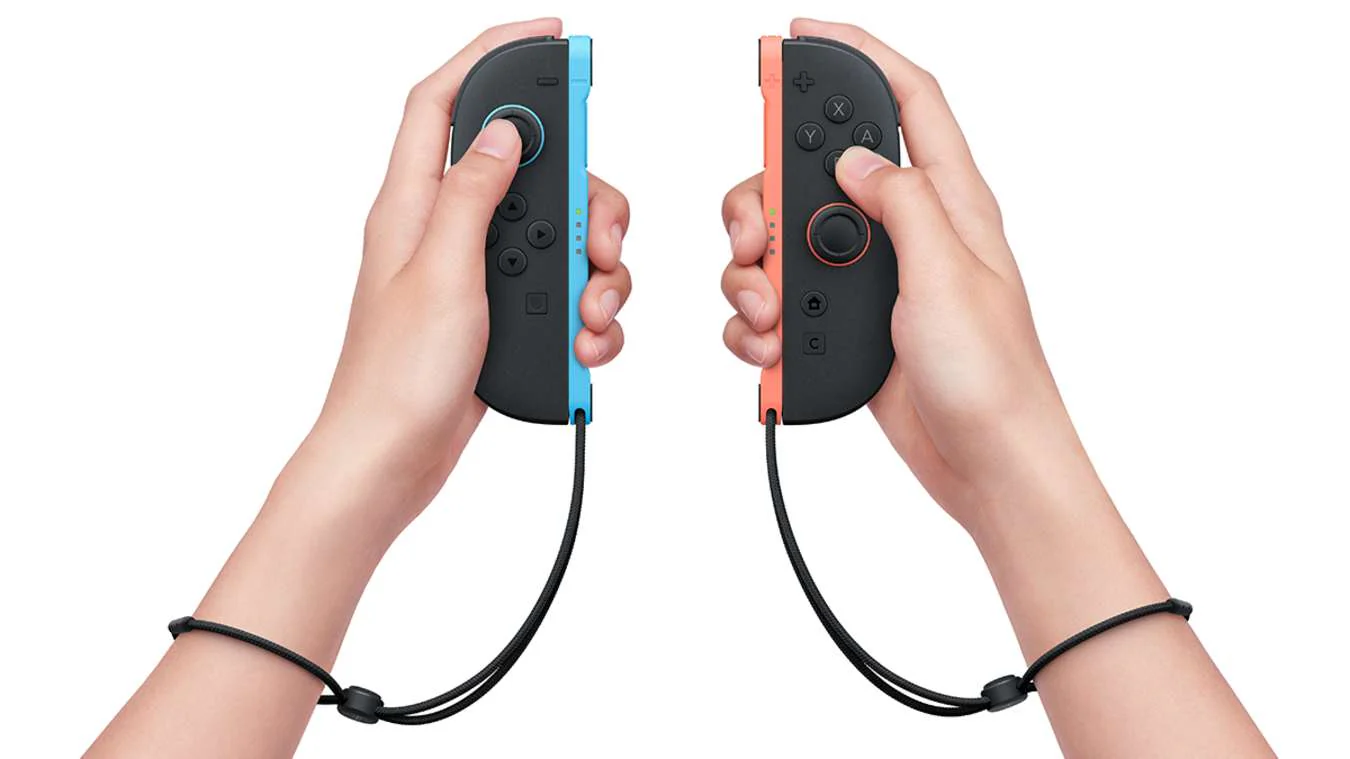 123677-nintendo-switch-2-both-joy-con-with-hands-vertical-wrist-straps-1200x675_copy