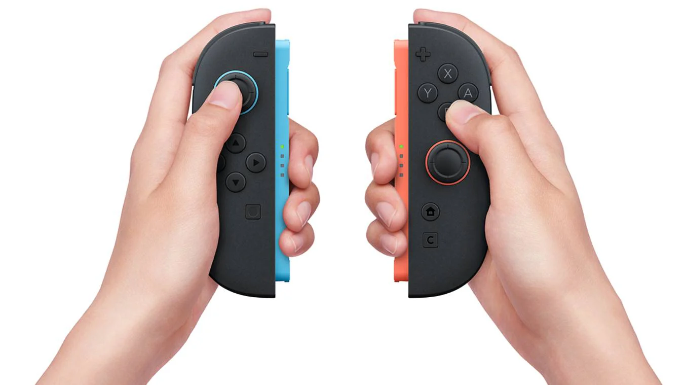 123677-nintendo-switch-2-joy-con-both-with-hands-vertical-1200x675_copy